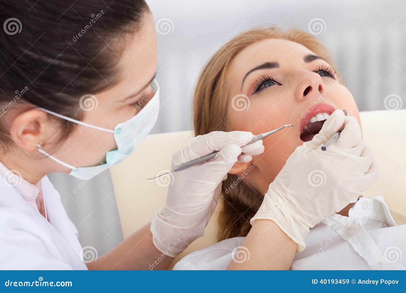 young woman having dental checkup