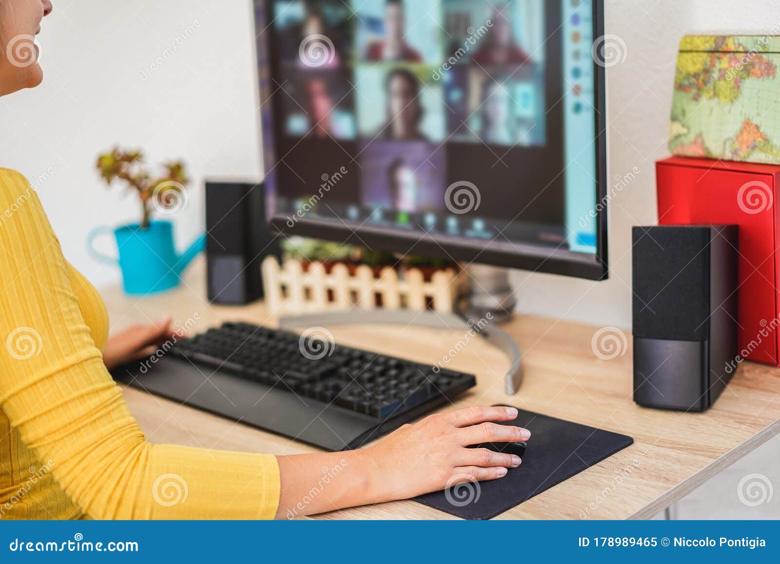 young woman having a discussion meeting in video call with her team - girl having chatting with friends on computer web app -