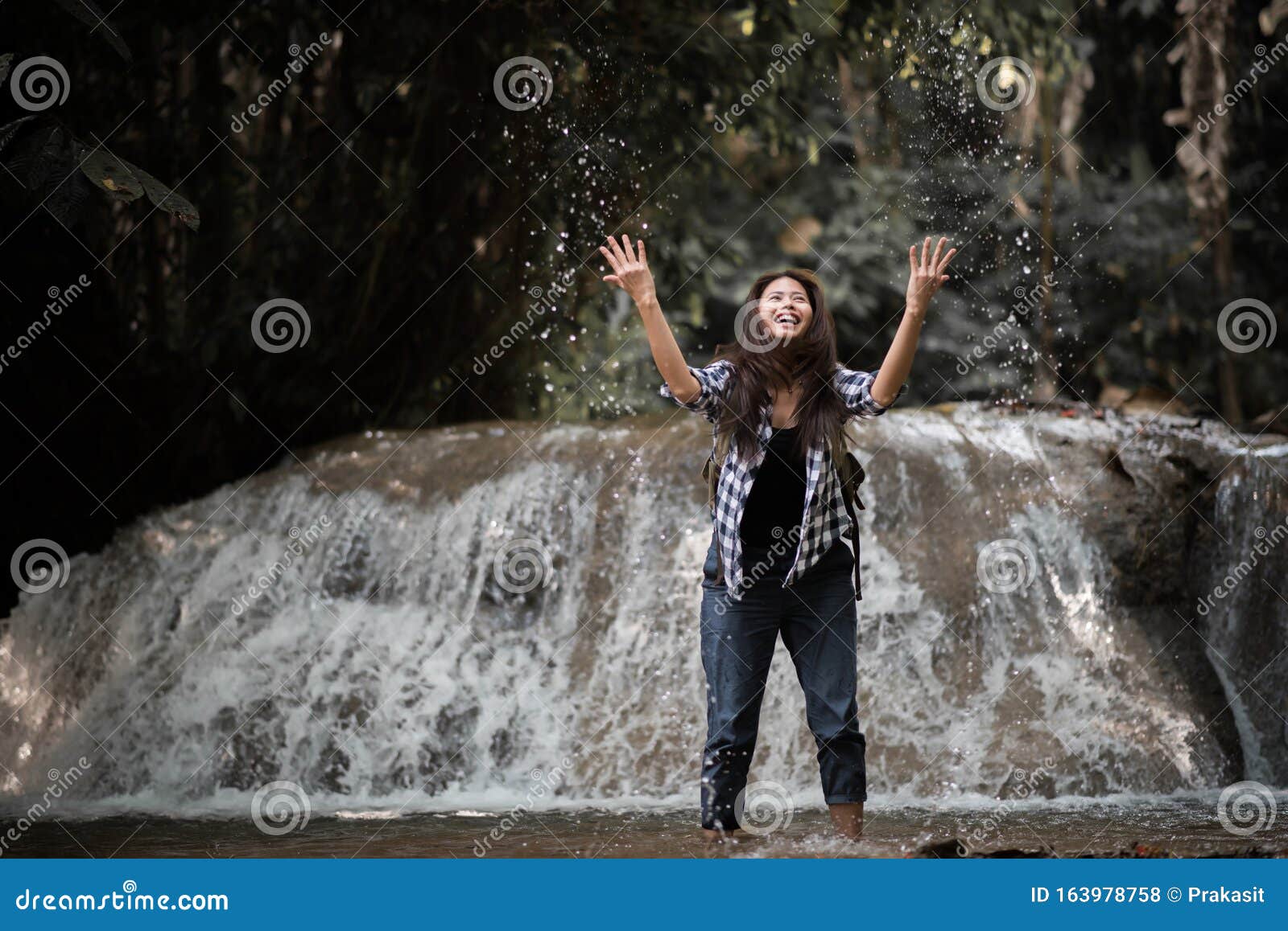 Young Woman Having Fun Under Waterfalls Stock Photo - Image of ...