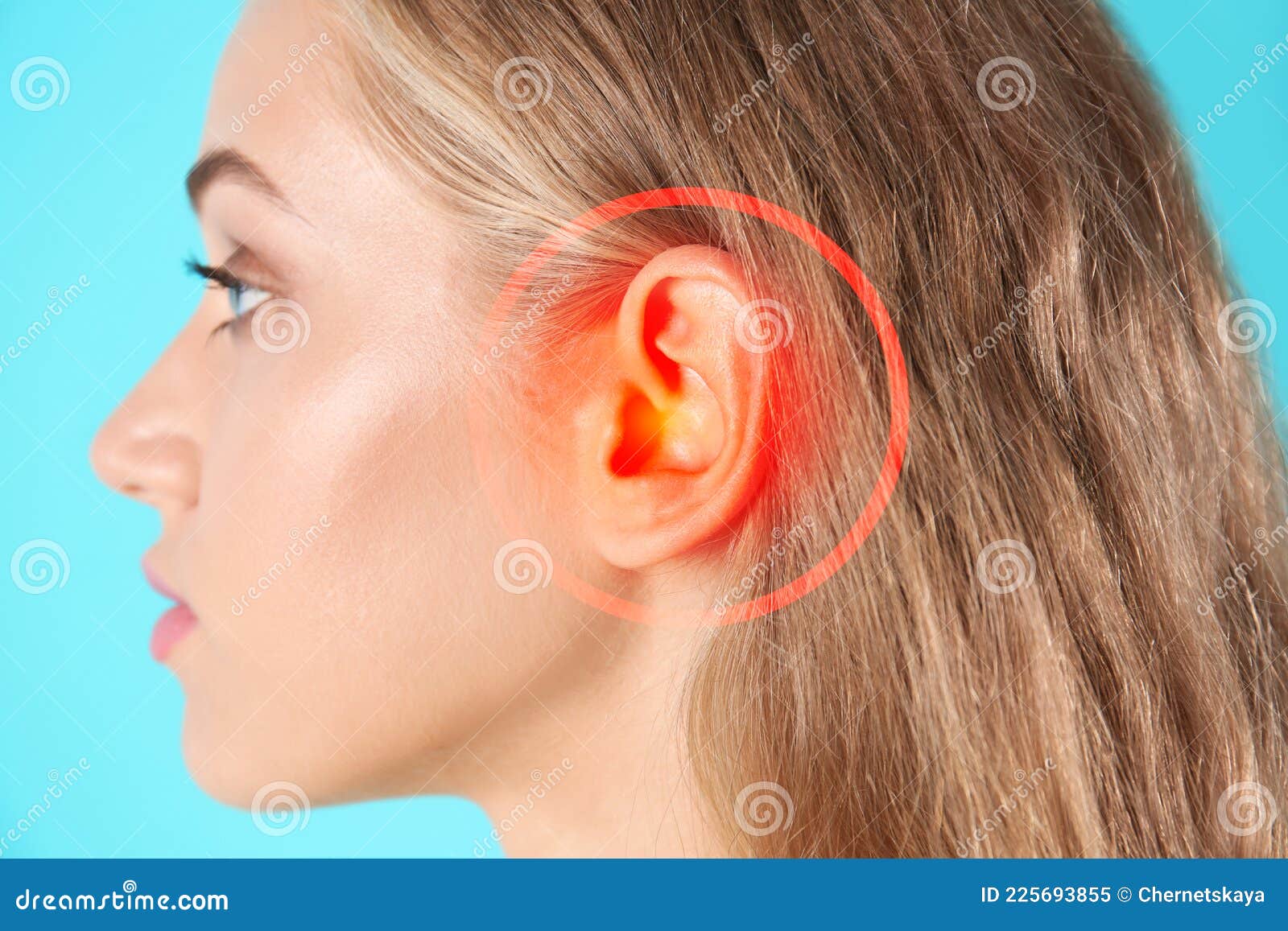 young woman with hearing problem on turquoise background, closeup