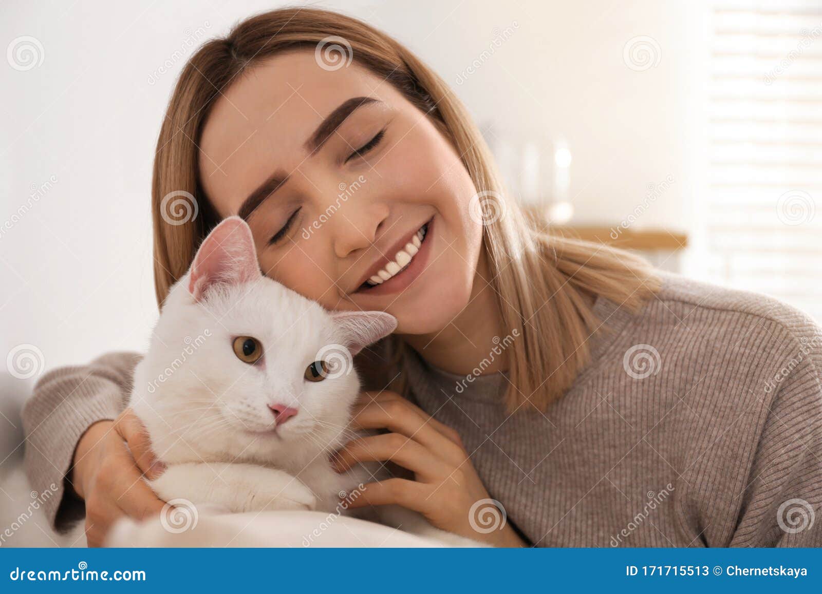 Young Woman with Her White Cat at Home. Fluffy Pet Stock Image - Image ...