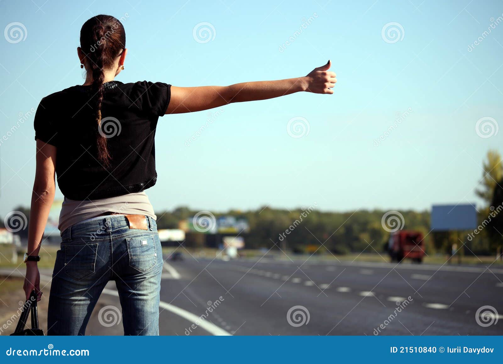 Young Woman Hitchhiking on the Road Stock Photo Image of outdoor