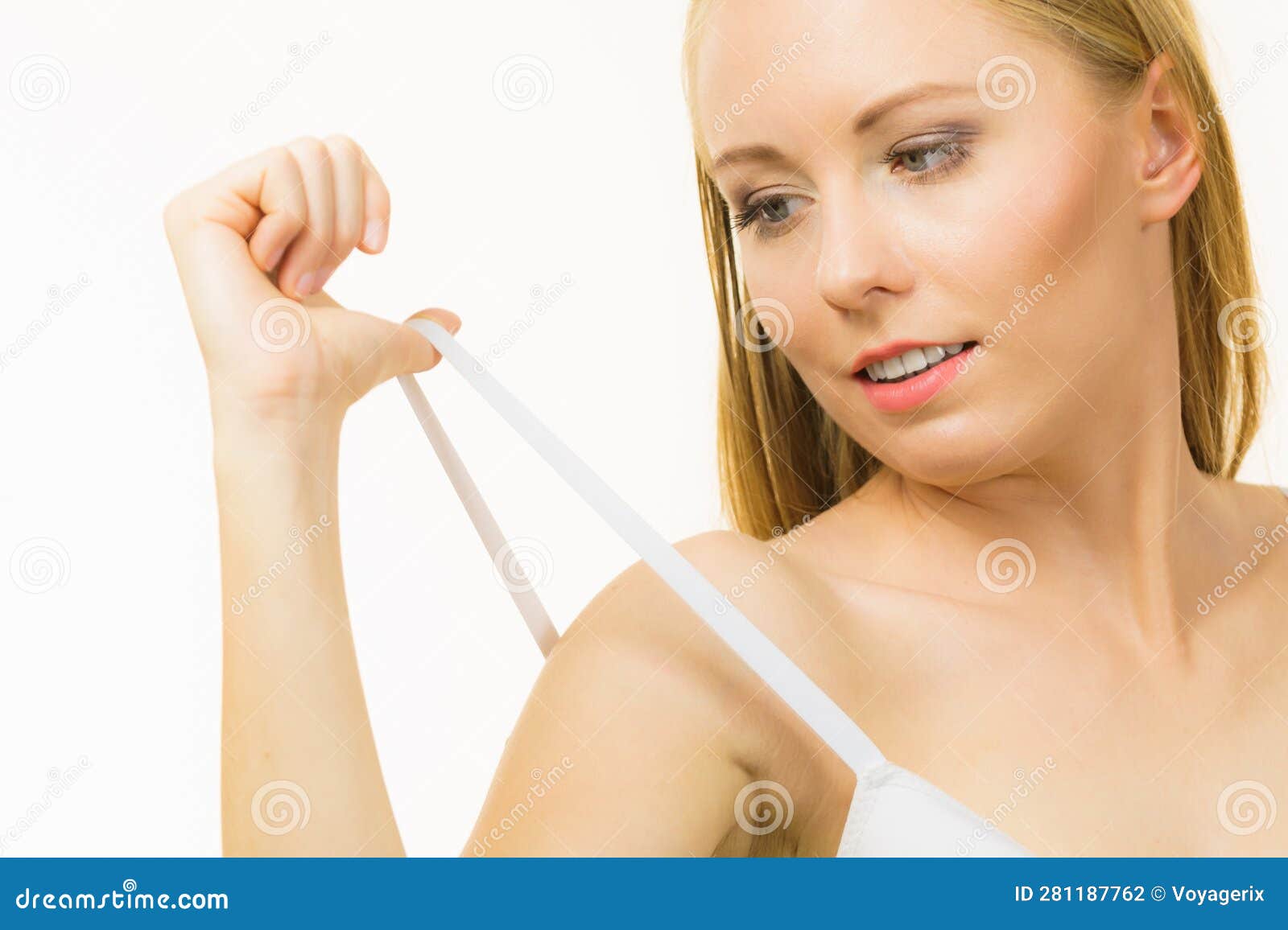 Young Woman Holding Bra Strap Stock Photo - Image of girl, adjust: 281187762