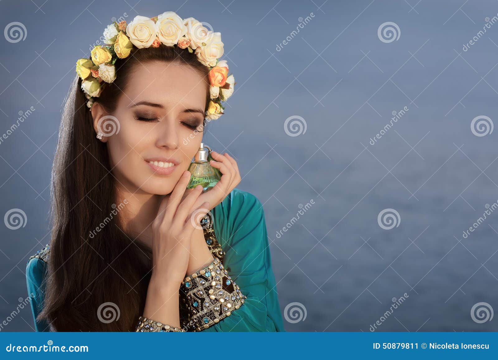 Young Woman Holding Perfume Bottle in Seaside Landscape Stock Image ...