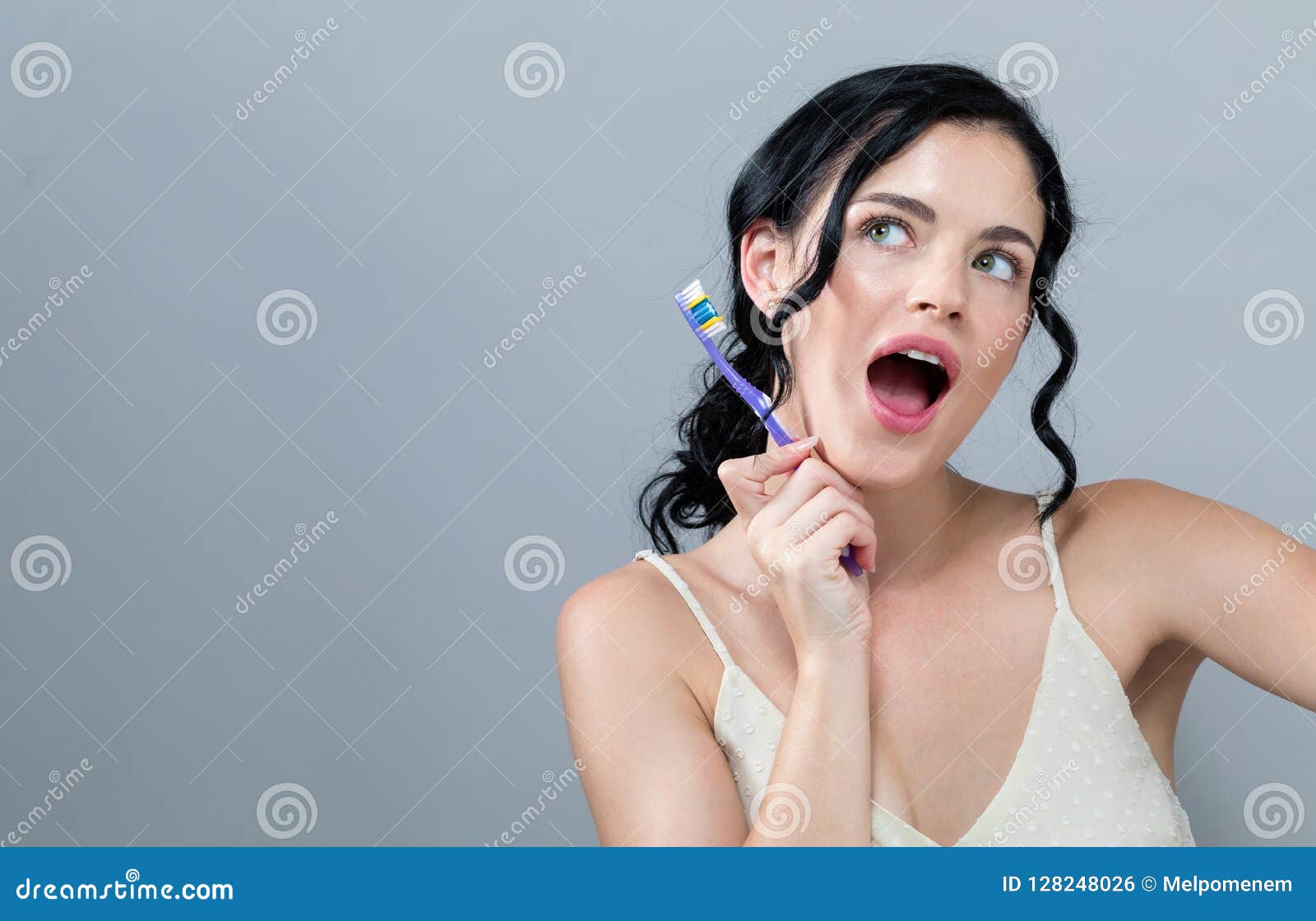 Young Woman Holding A Toothbrush Stock Photo Image Of Color Teeth