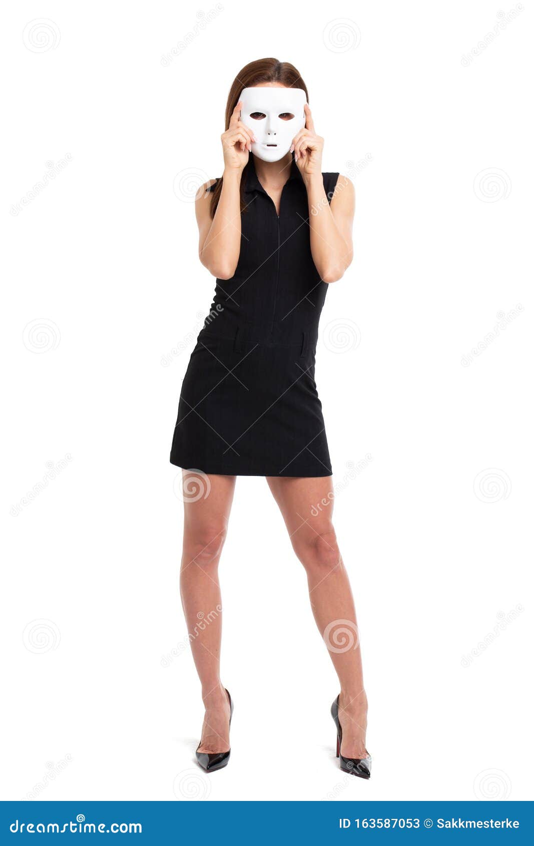 young woman holding white mask in front of face full body 