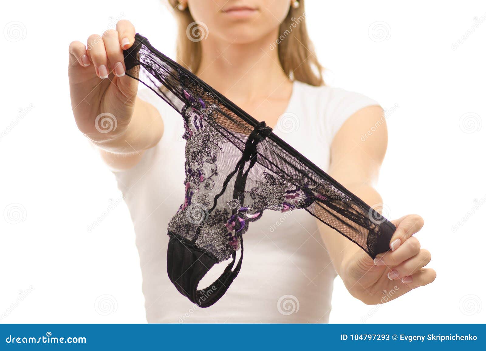 Young Woman Holds Black Thong Panties Stock Image - Image of natural,  indoor: 104797293