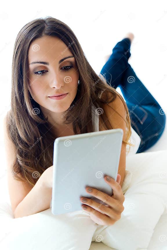 Young Woman at Home with Digital Tablet. Isolated on White Stock Image ...