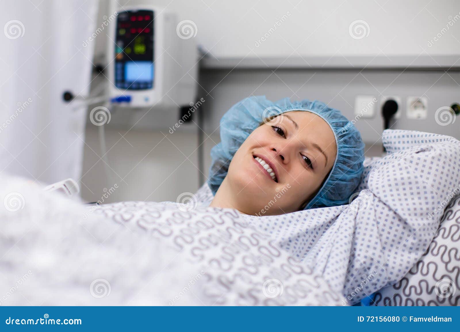 young woman in hospital recovery room after surgery