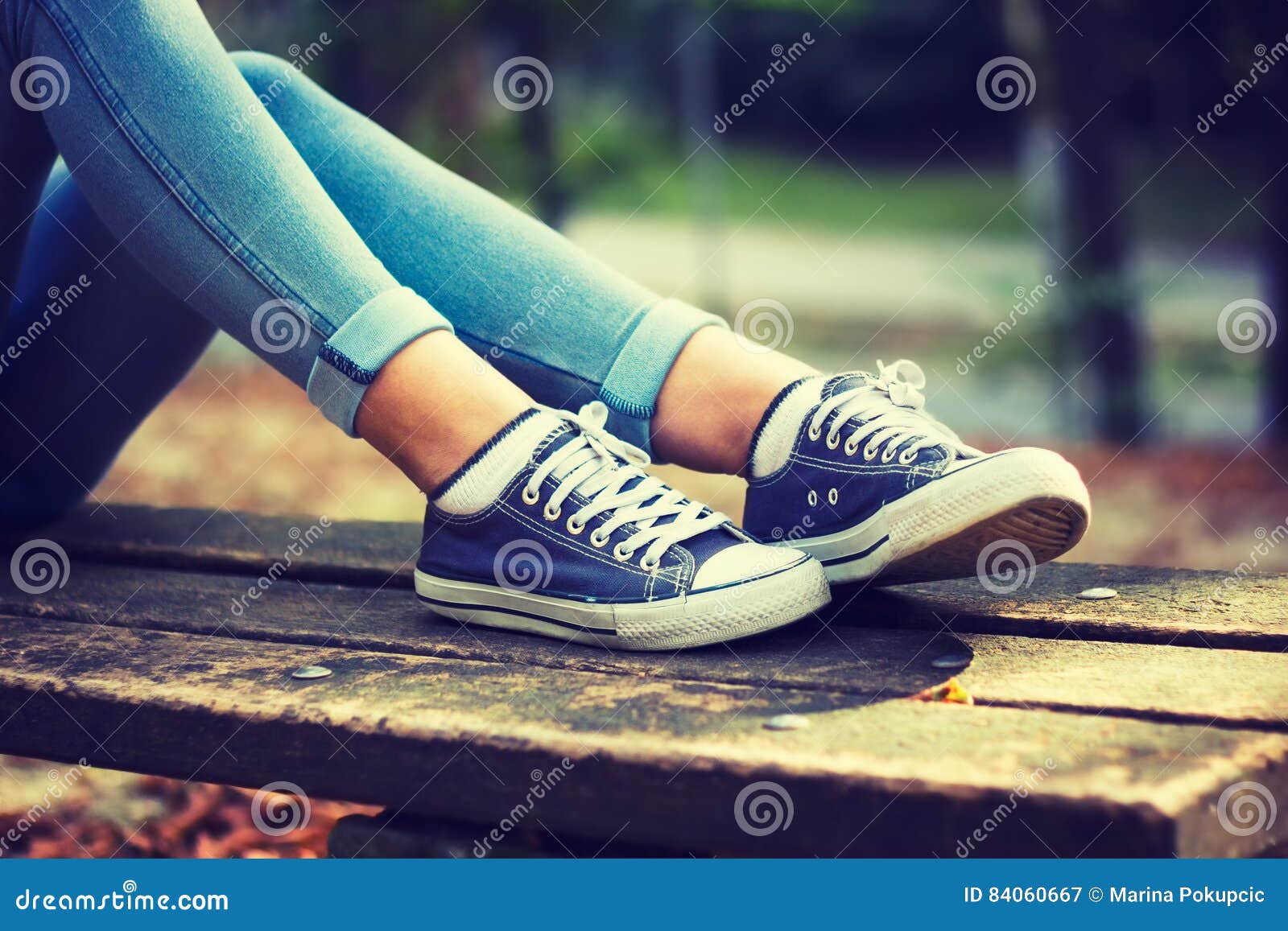 Young Woman in Jeans and Blue Sneakers Stock Image - Image of trendy ...