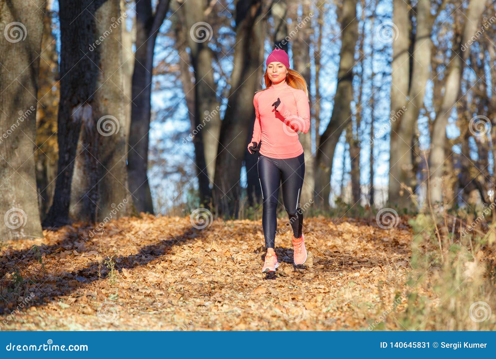 Young Woman Jogging on Trail in Autumn Park Stock Image - Image of cold ...