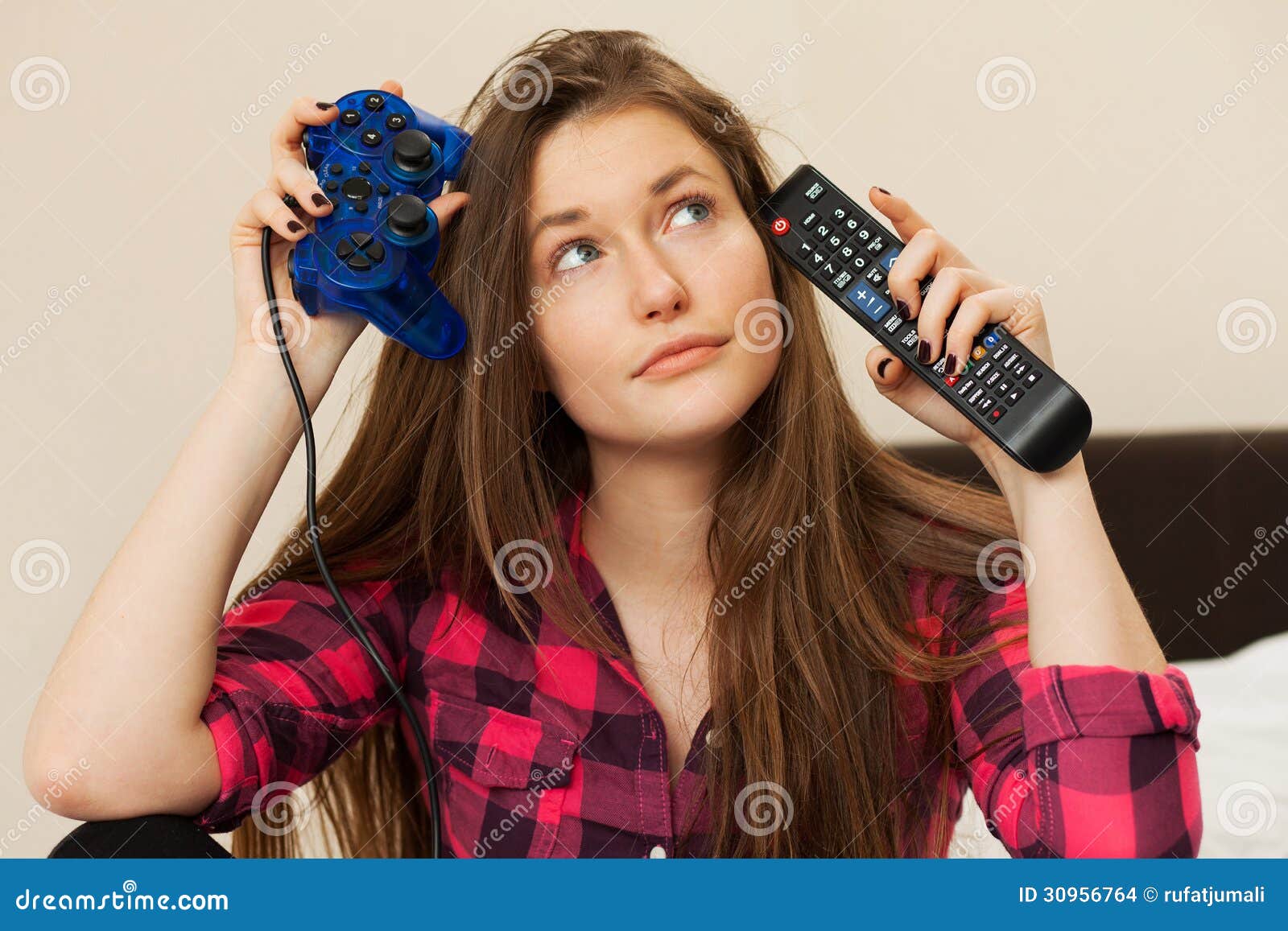 Young Woman With Joystick And TV Console Stock Photo ...