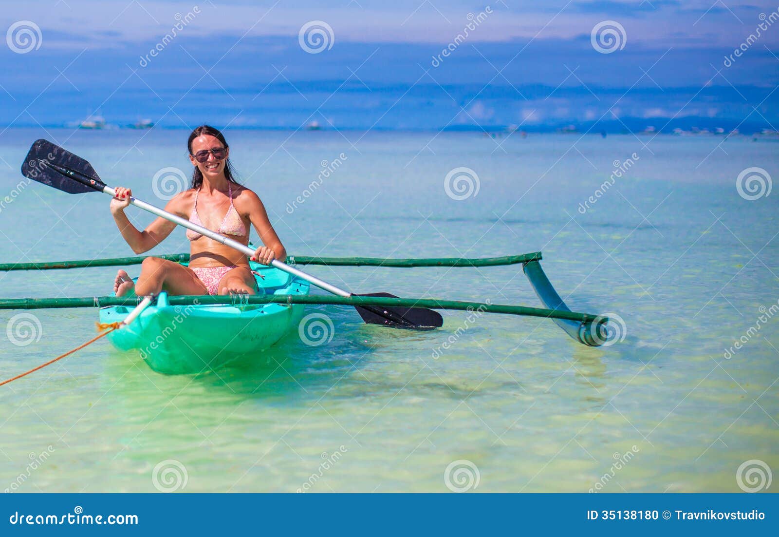 Young Woman Kayaking Alone in the Clear Blue Sea Stock Photo Image of