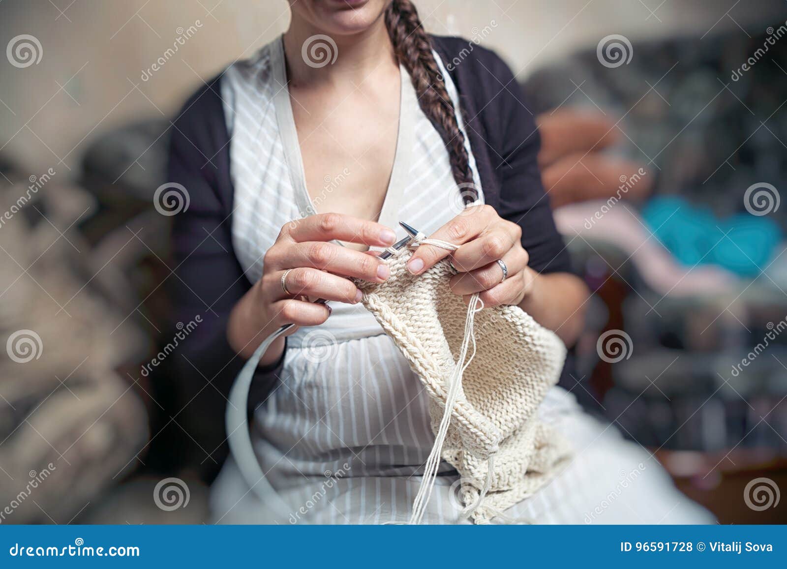 young woman knits