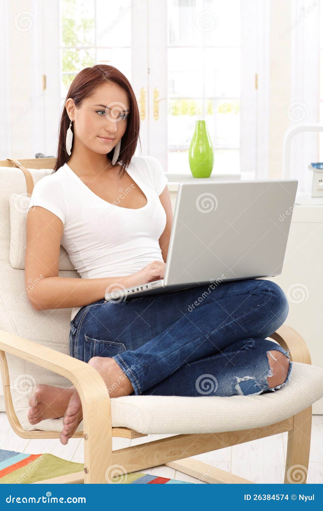 Young Woman with Laptop at Home Stock Photo Image of leisure, jeans