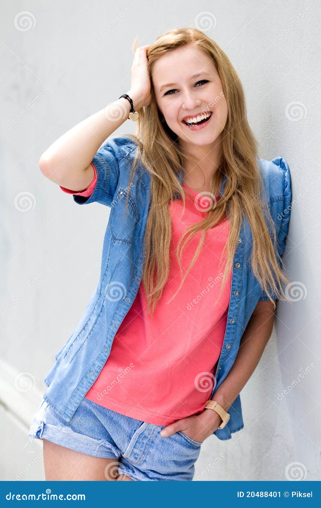 Young Woman Leaning Against Wall Stock Image - Image of girl, wall ...