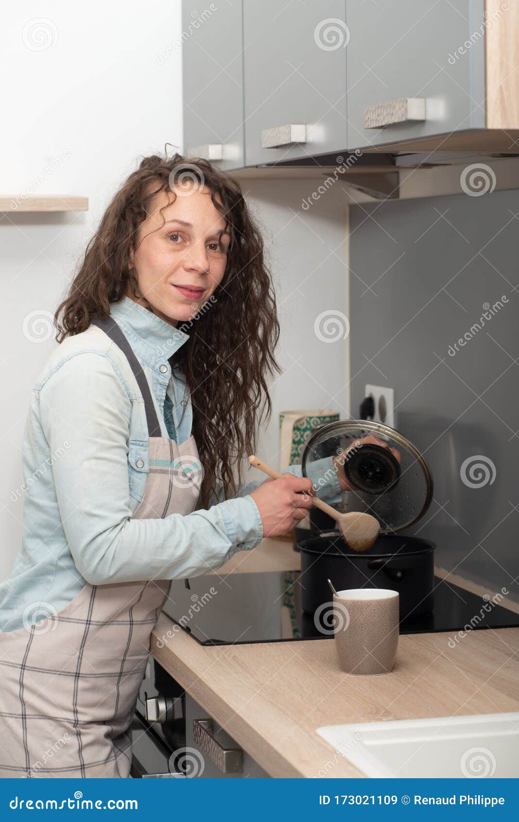 Young Woman with Long Hair is in the Kitchen Stock Image Image of