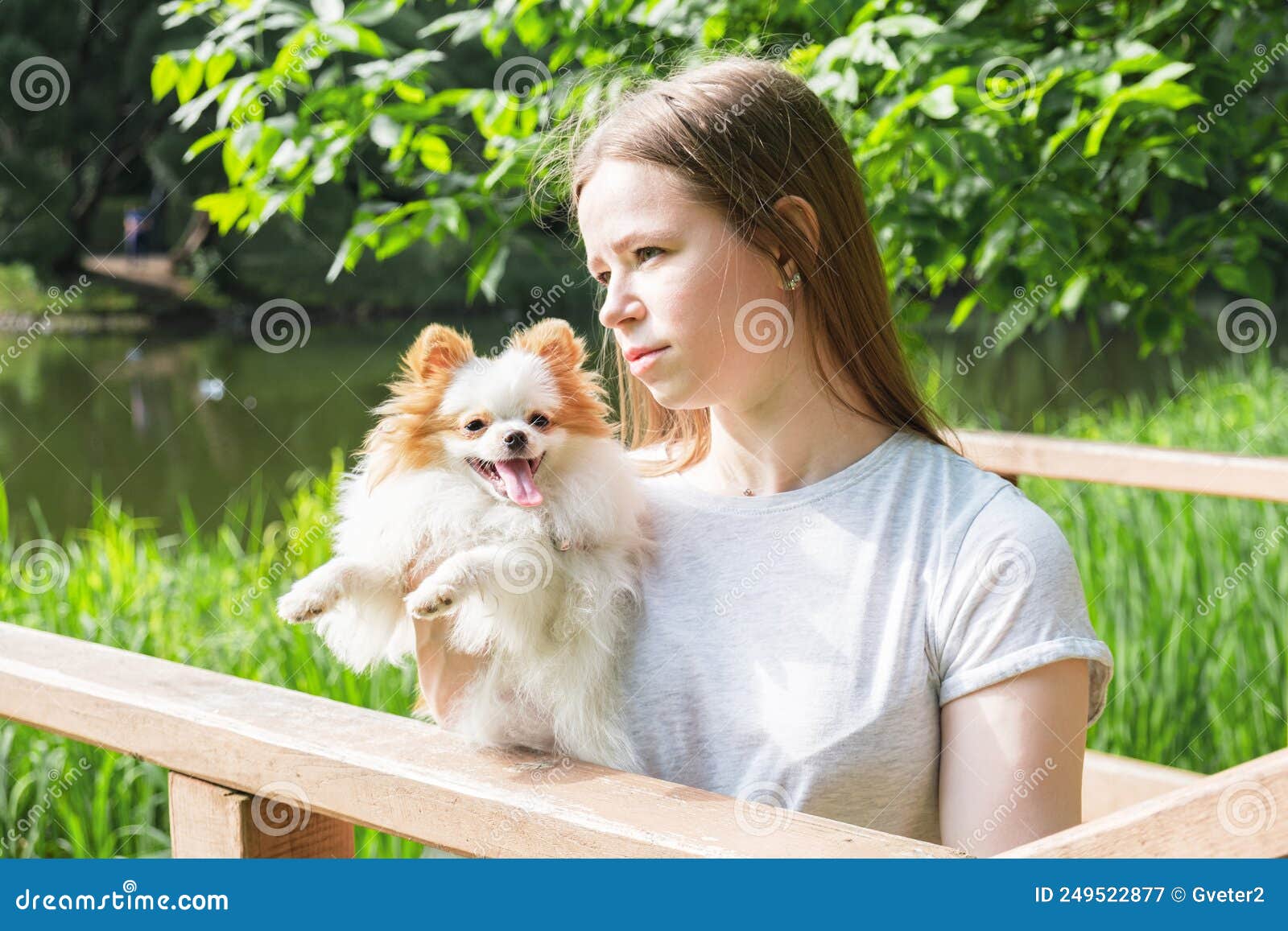 Young Woman with Long Straight Hair and Fluffy Small Dog for Walk in Park Stock Image - Image of care, friendship: 249522877 Young Woman with Long Straight Hair and Fluffy Small Dog for Walk in Park Stock Image - Image of care, friendship: 249522877