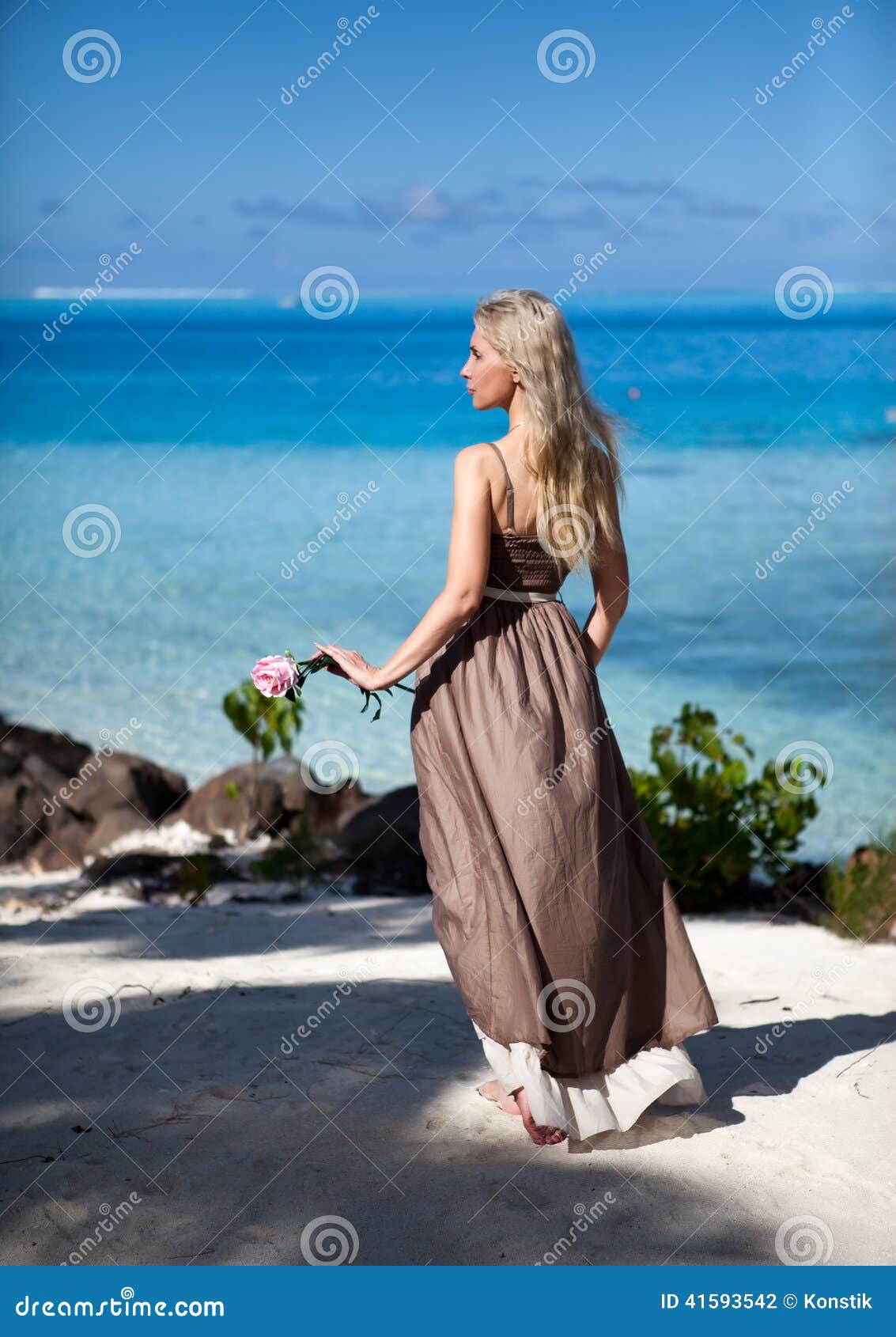 Young Woman in a Long Sundress on a Tropical Beach. Polynesia Stock ...