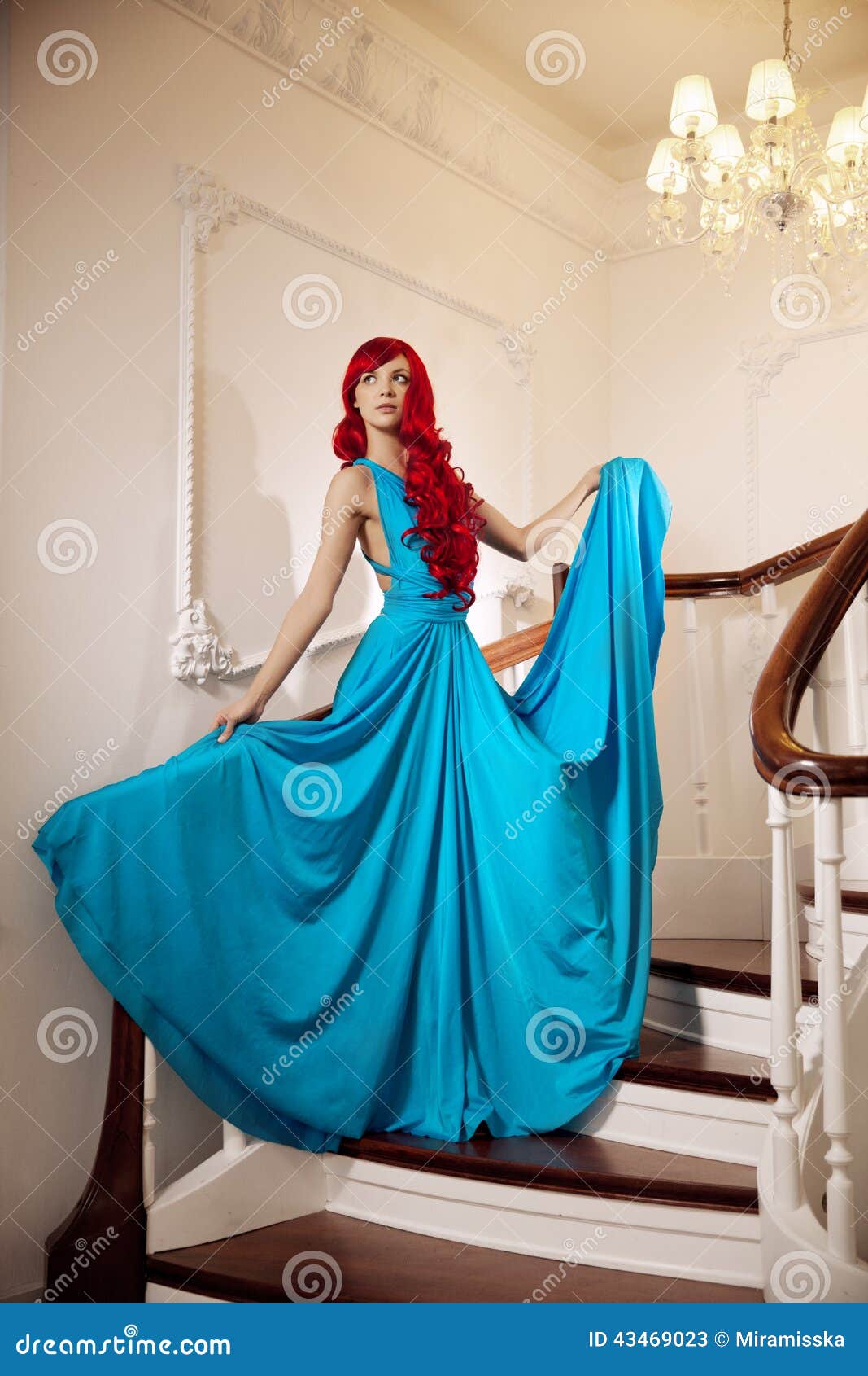 Young Woman With Luxurious Long Beautiful Red Hair In A 