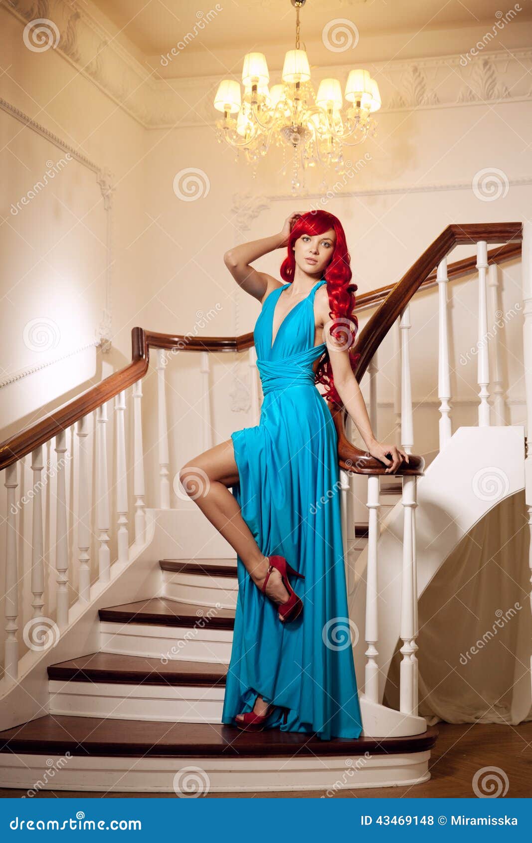 Young Woman With Luxurious Long Beautiful Red Hair In A 