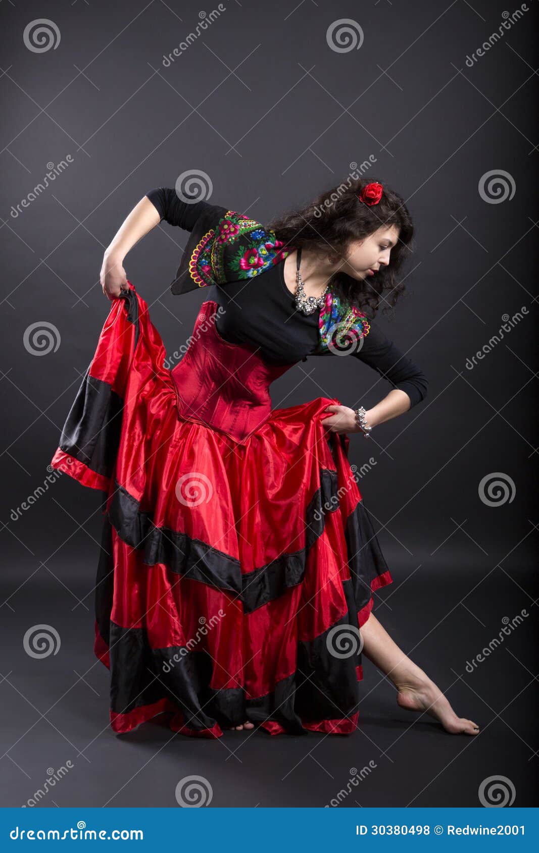 Young Woman Make Step In Spanish Traditional Clothes 