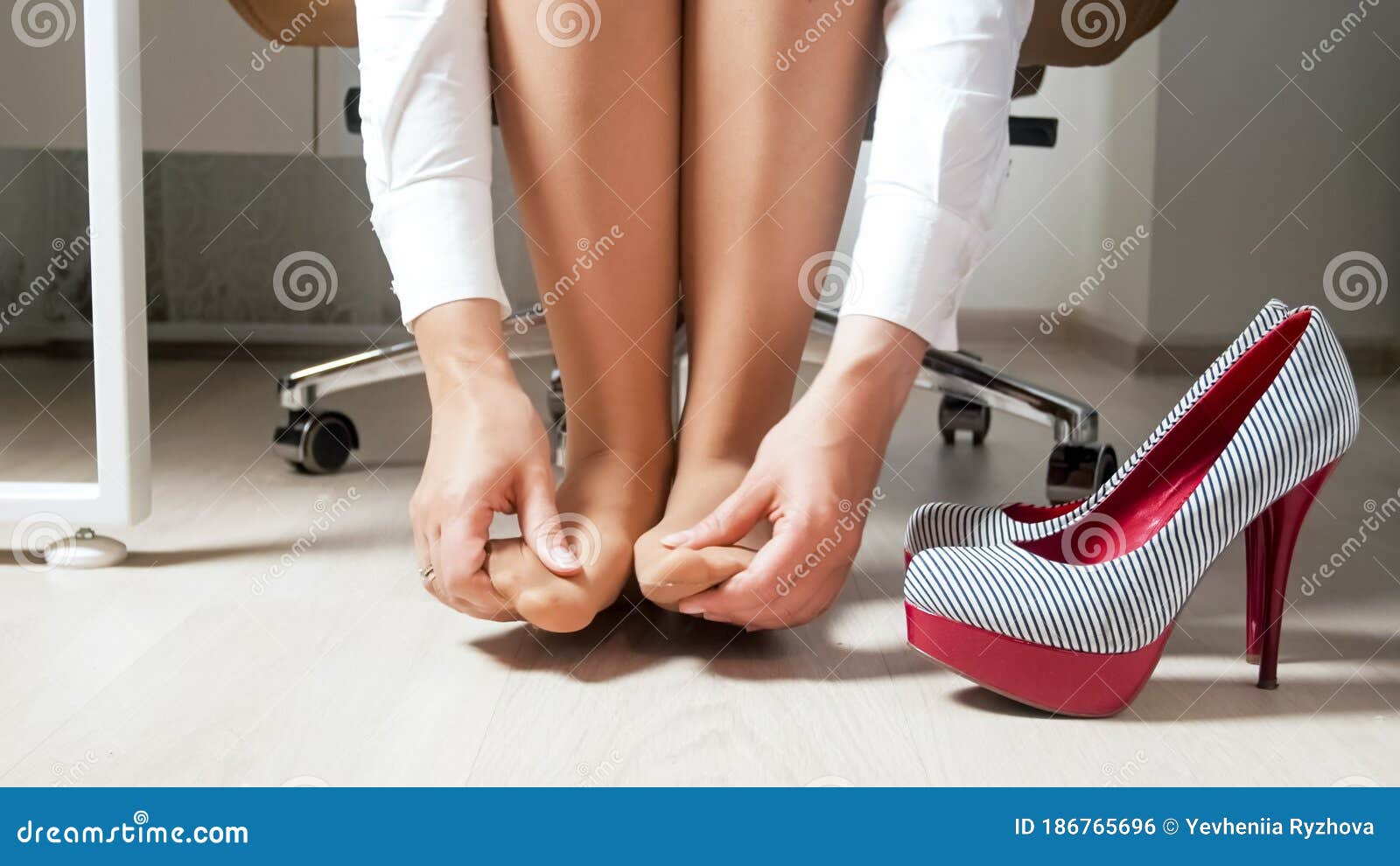 Stocking Feet On Desk