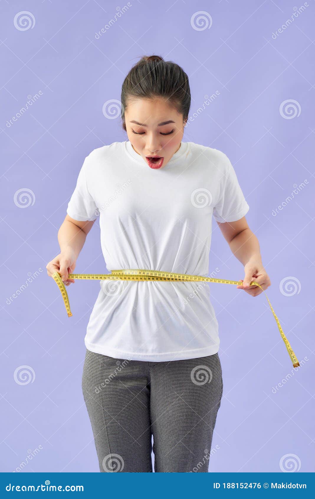 Young Woman Measuring Waist with Measuring Tape Stock Photo - Image of ...