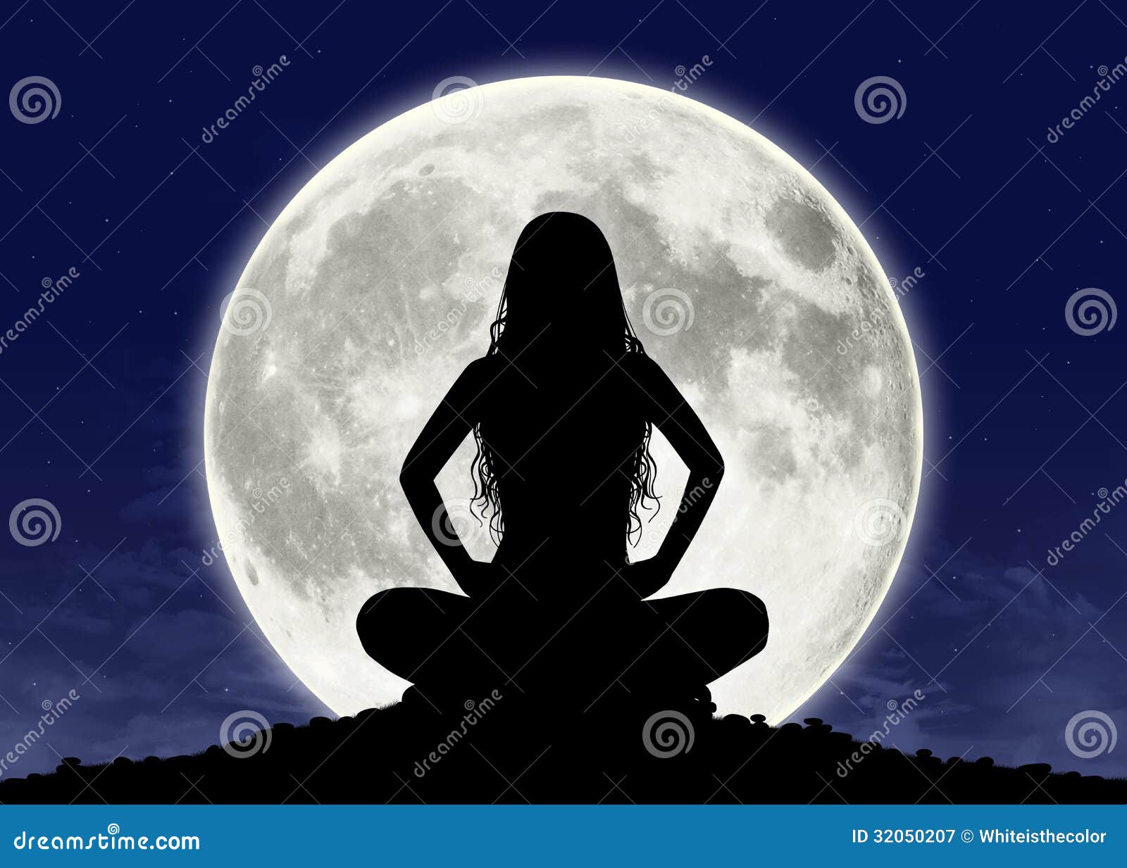 young woman in meditation at the full moon