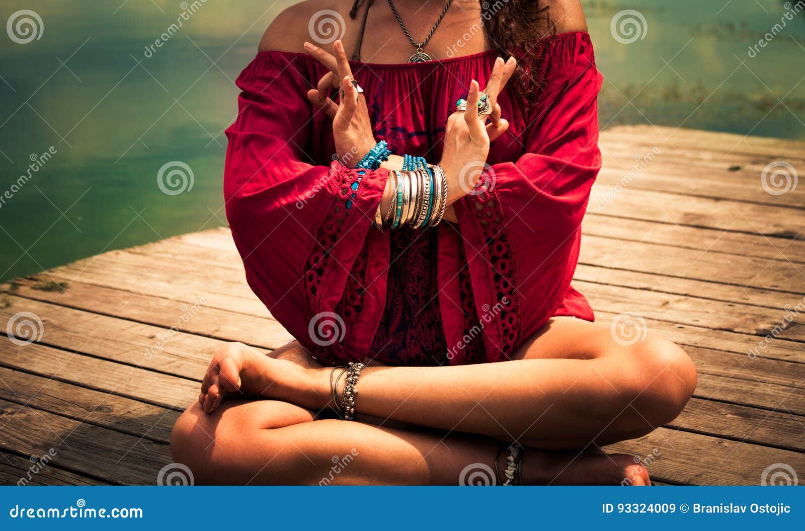 young woman in a meditative yoga position outdoor