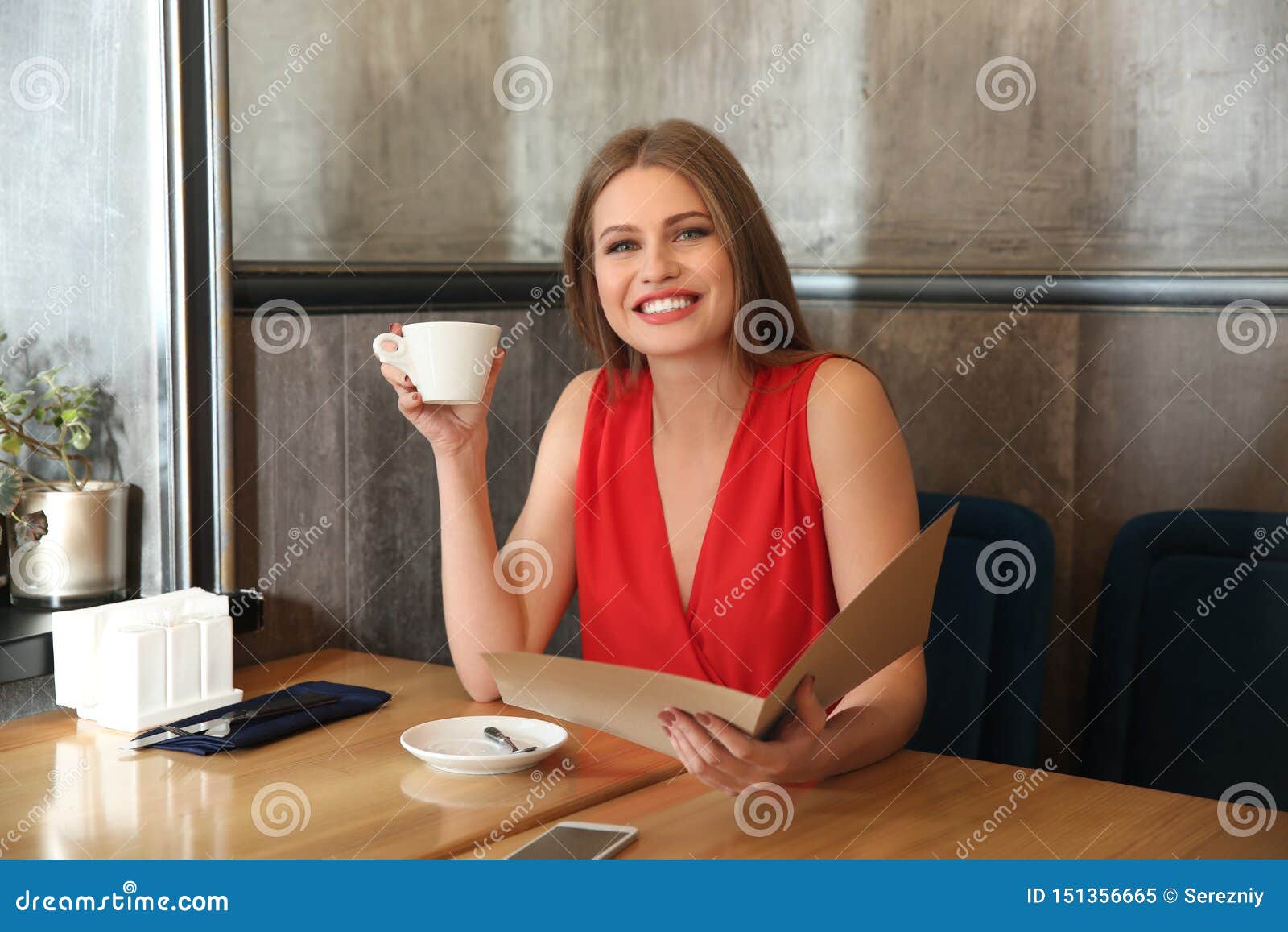 Young Woman With Menu Sitting In Restaurant Stock Image Image Of