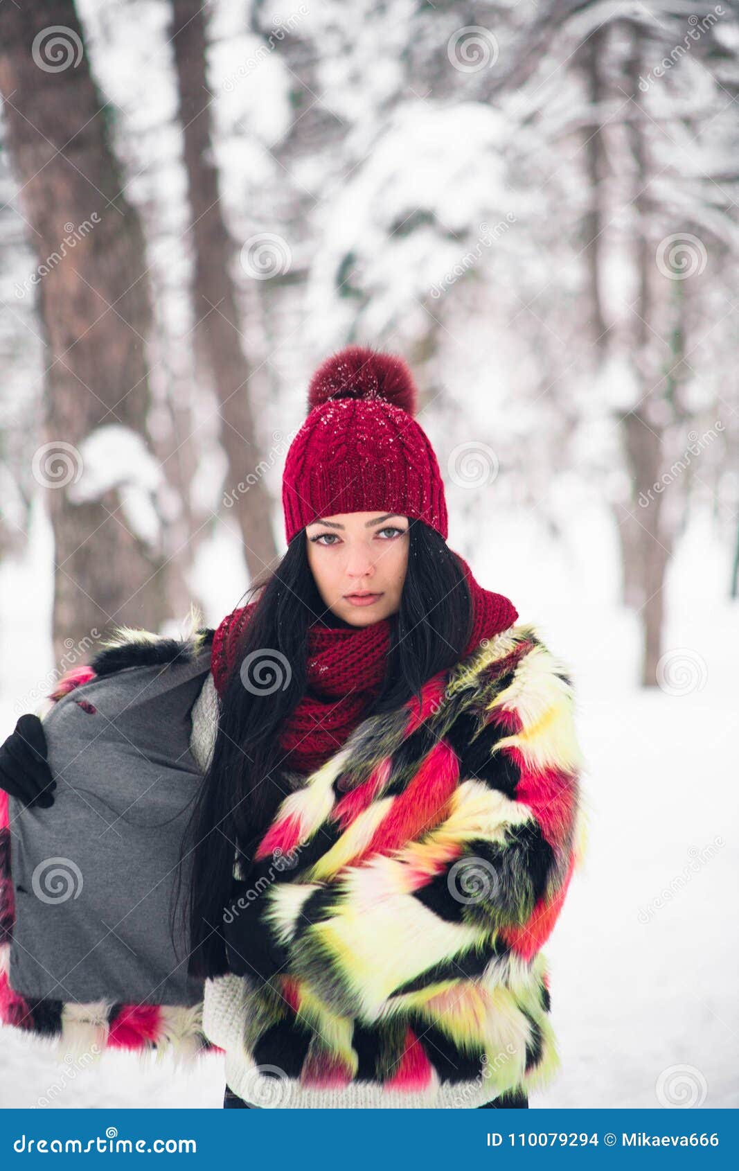 Young Woman in Multi-colored Fur Coat Stock Photo - Image of cheerful ...