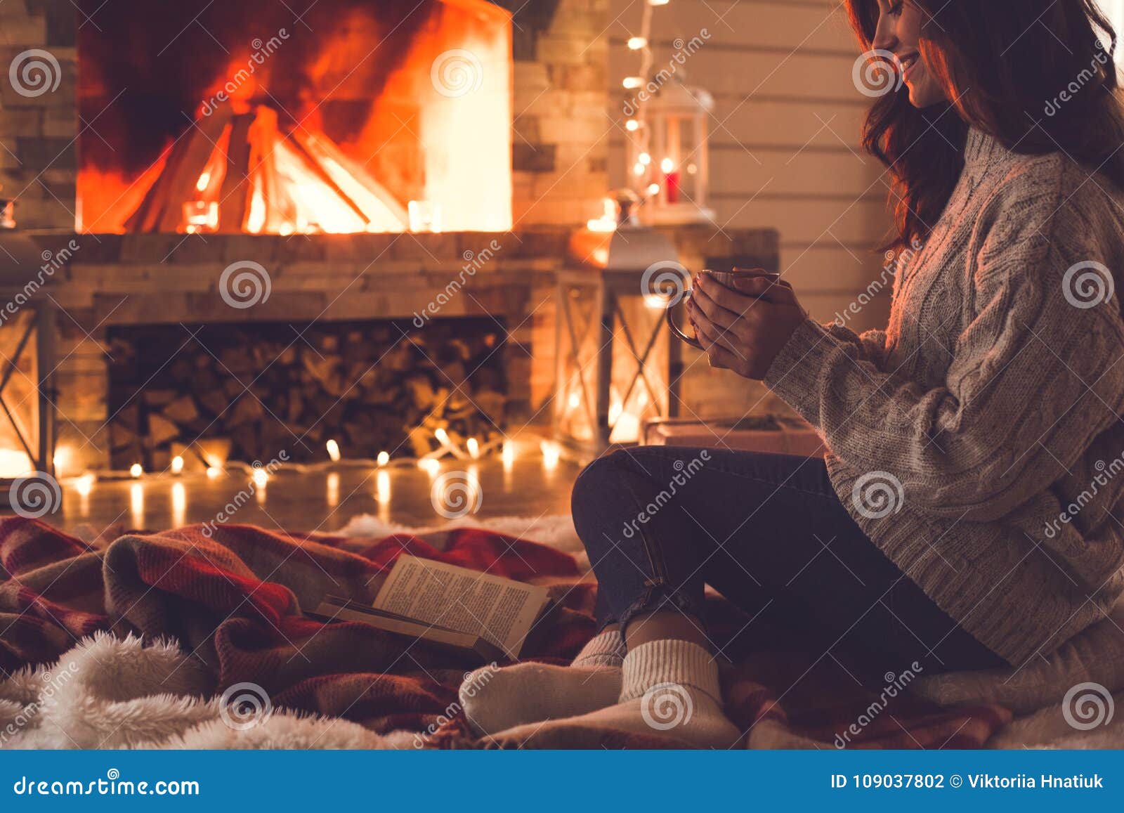 Young Woman Near Fireplace at Home Winter Concept Holding Cup Stock ...