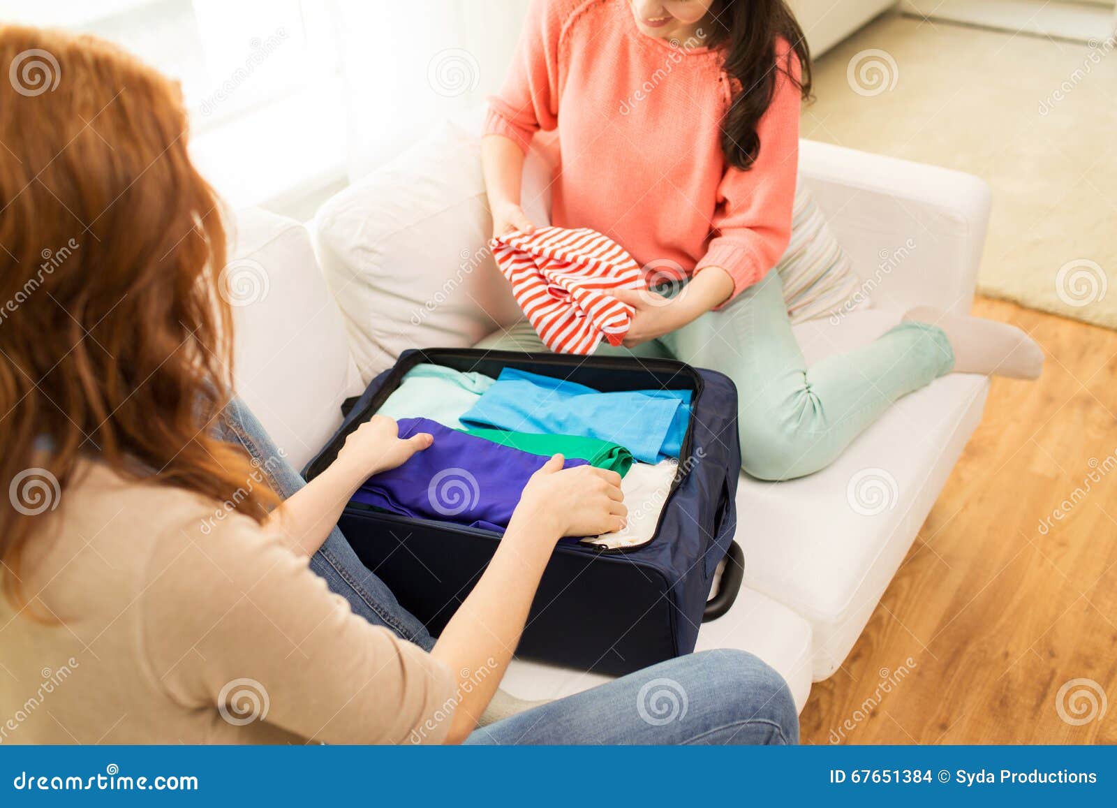 Young Woman Packing Clothes into Travel Bag Stock Image - Image of