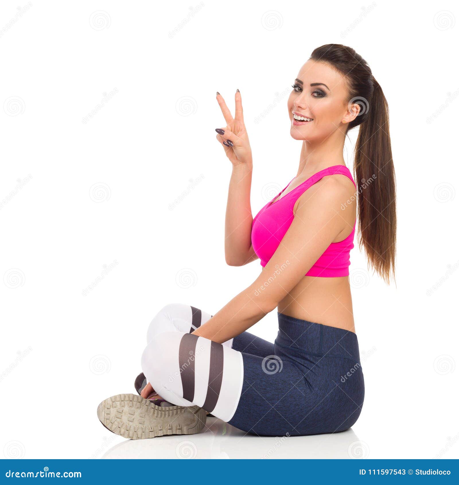 Woman in Workout Clothes Sitting Stock Photo - Image of peaceful