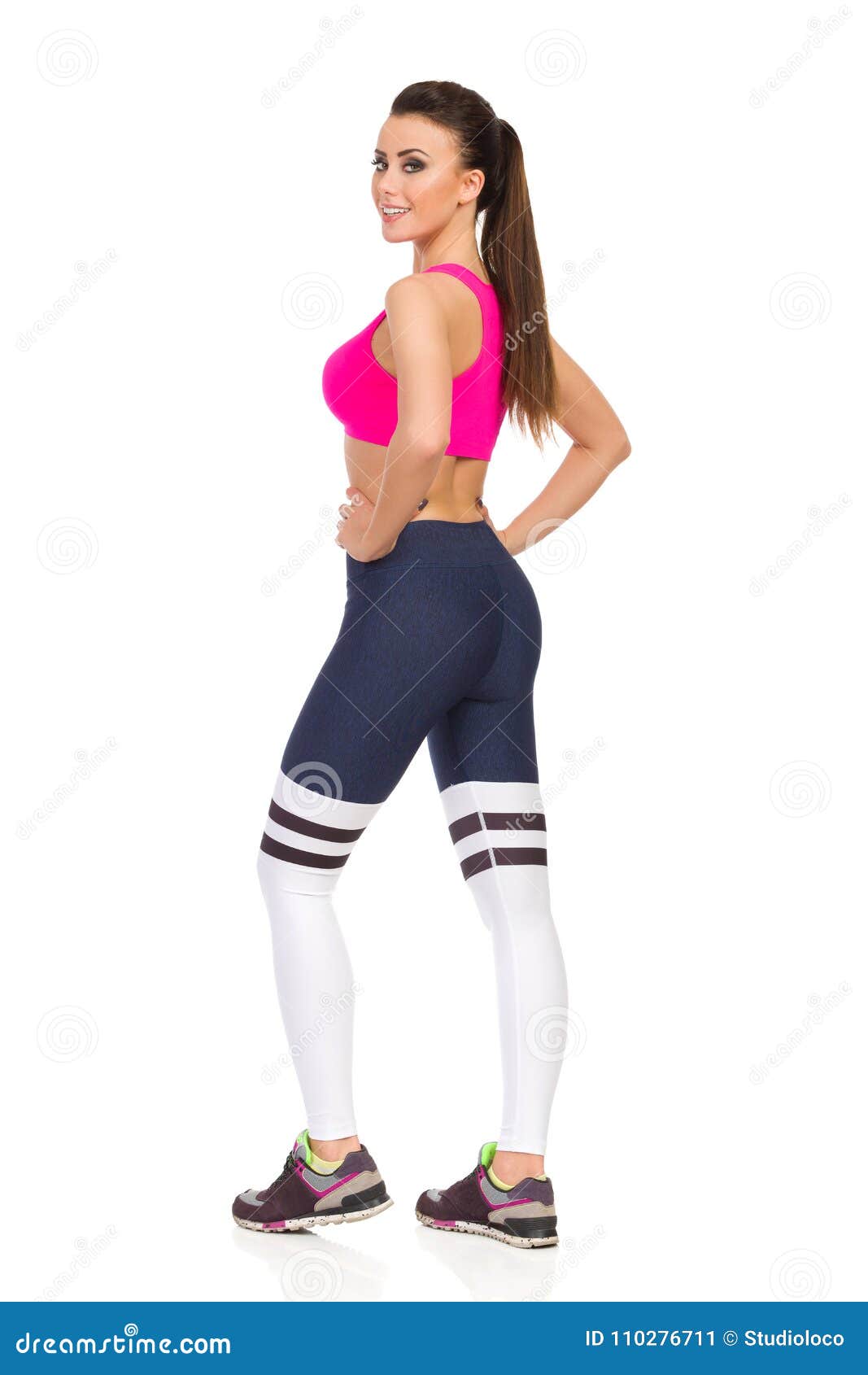 Download Beautiful Young Woman In Pink Sports Bra And Striped ...