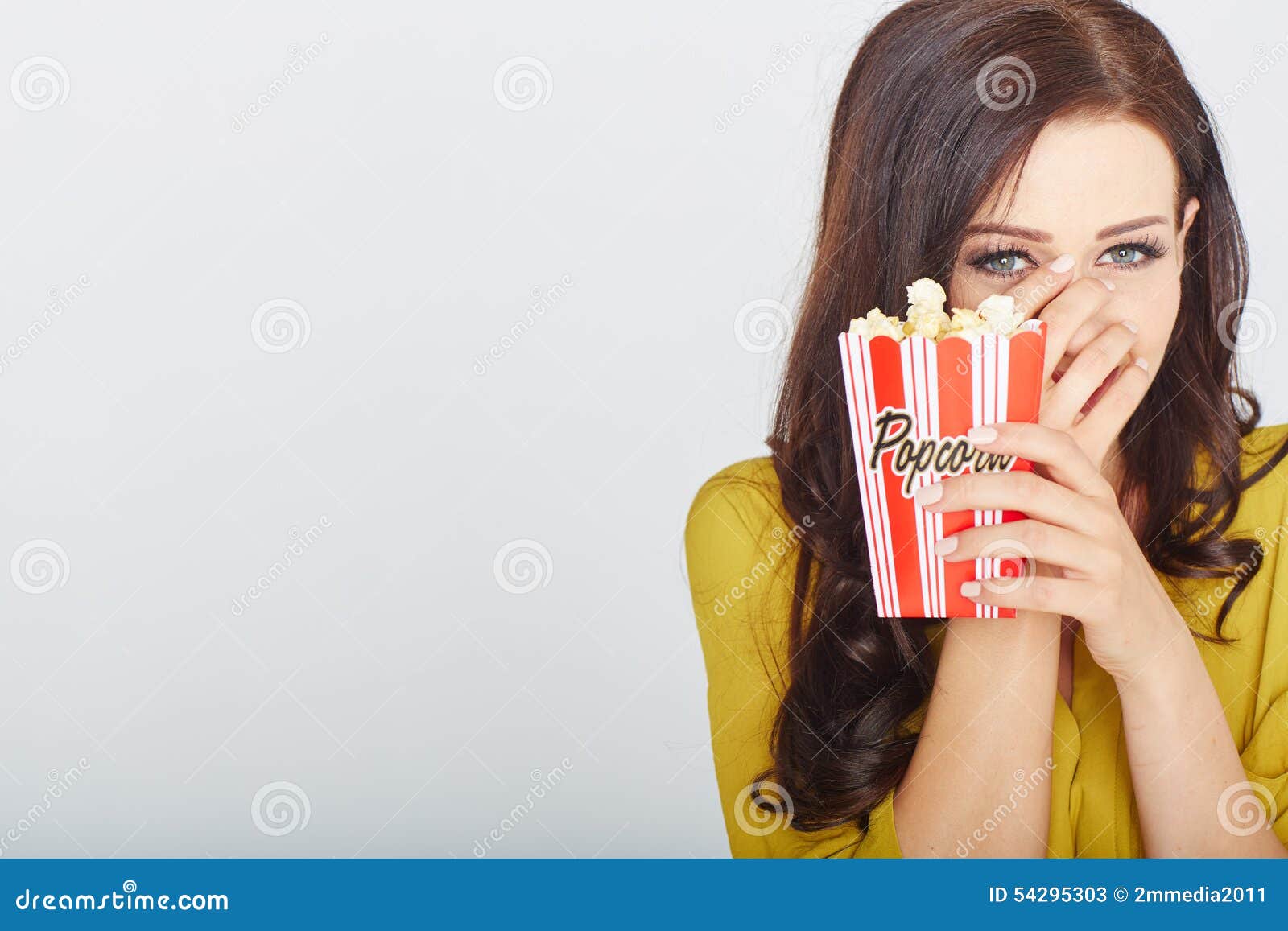 Young woman with popcorn stock image. Image of attractive 54295303