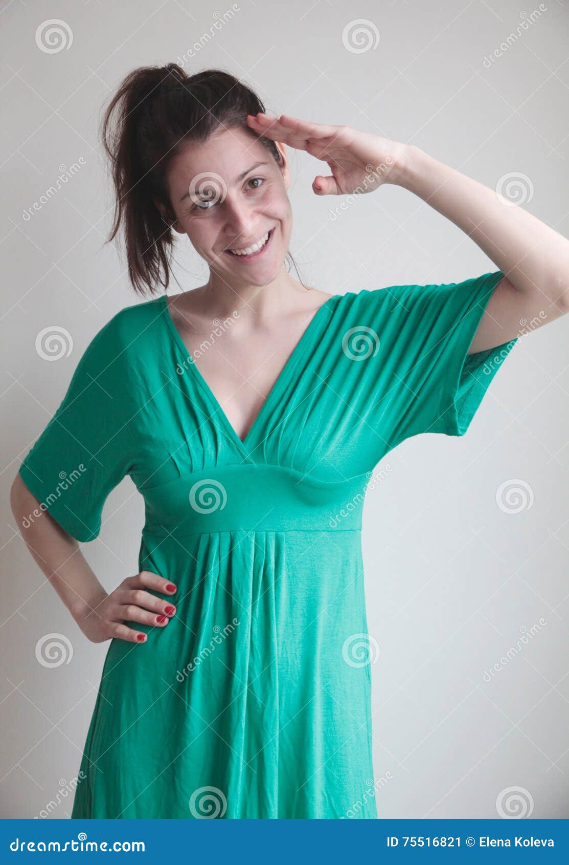 young woman posing for military salute