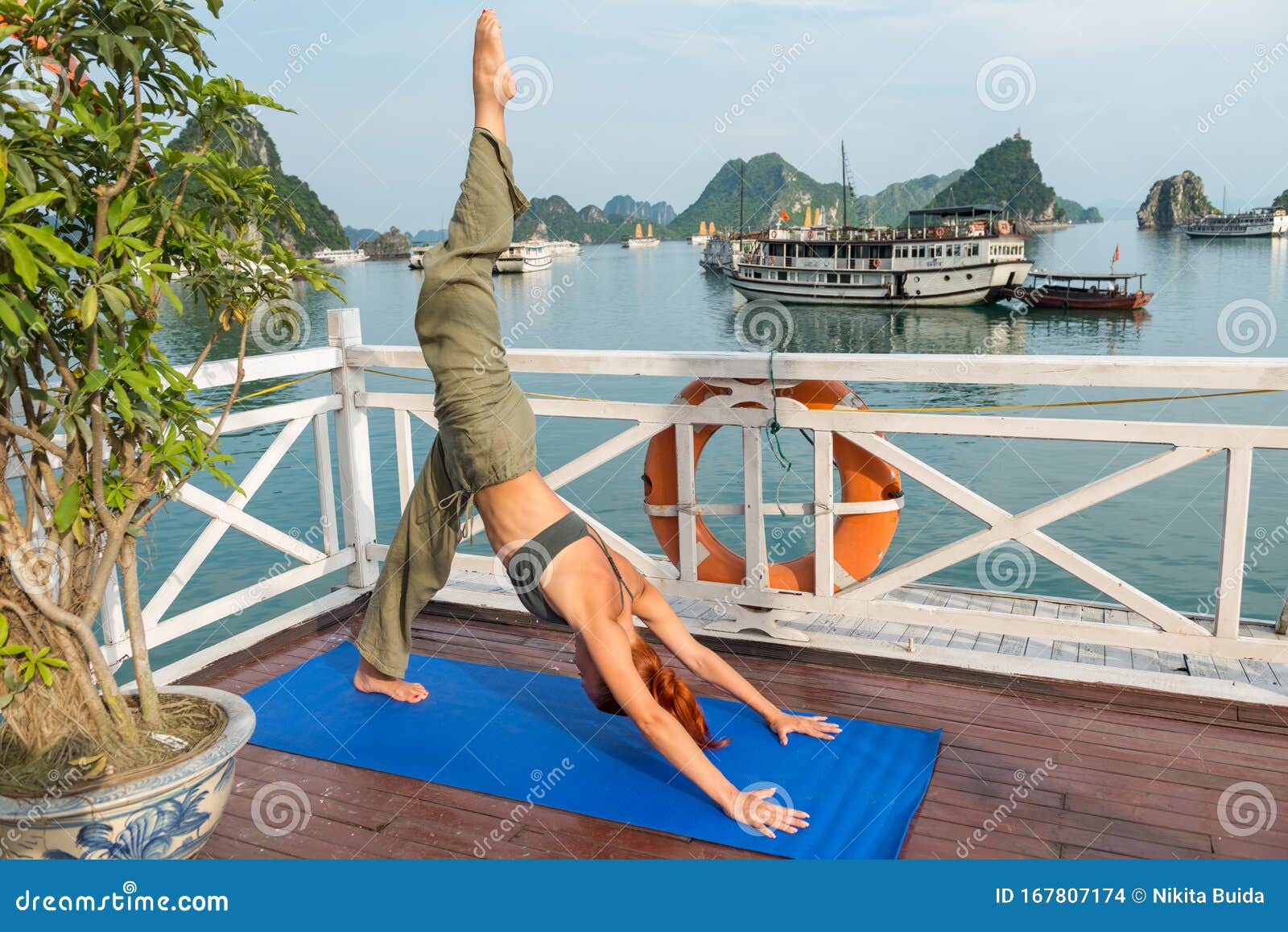 Young Woman Practicing Yoga Stock Photo - Image of blue, indochina ...