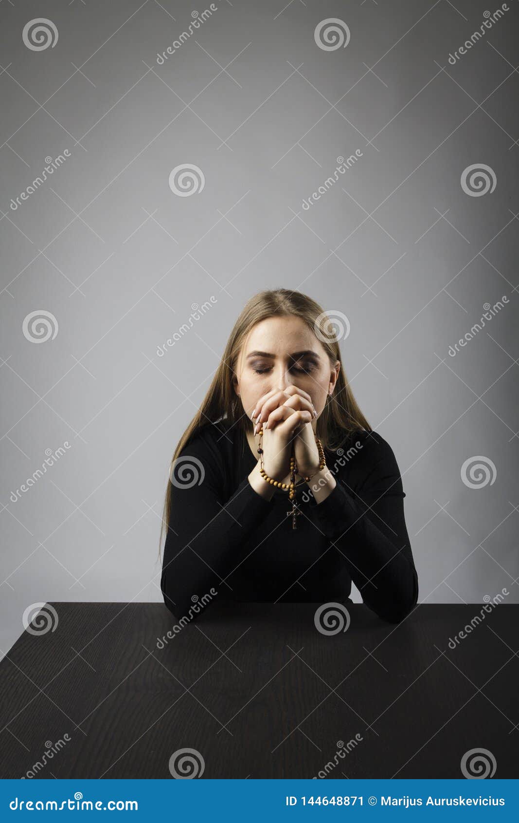Young Woman is Praying with Rosary Beads Stock Image - Image of pity