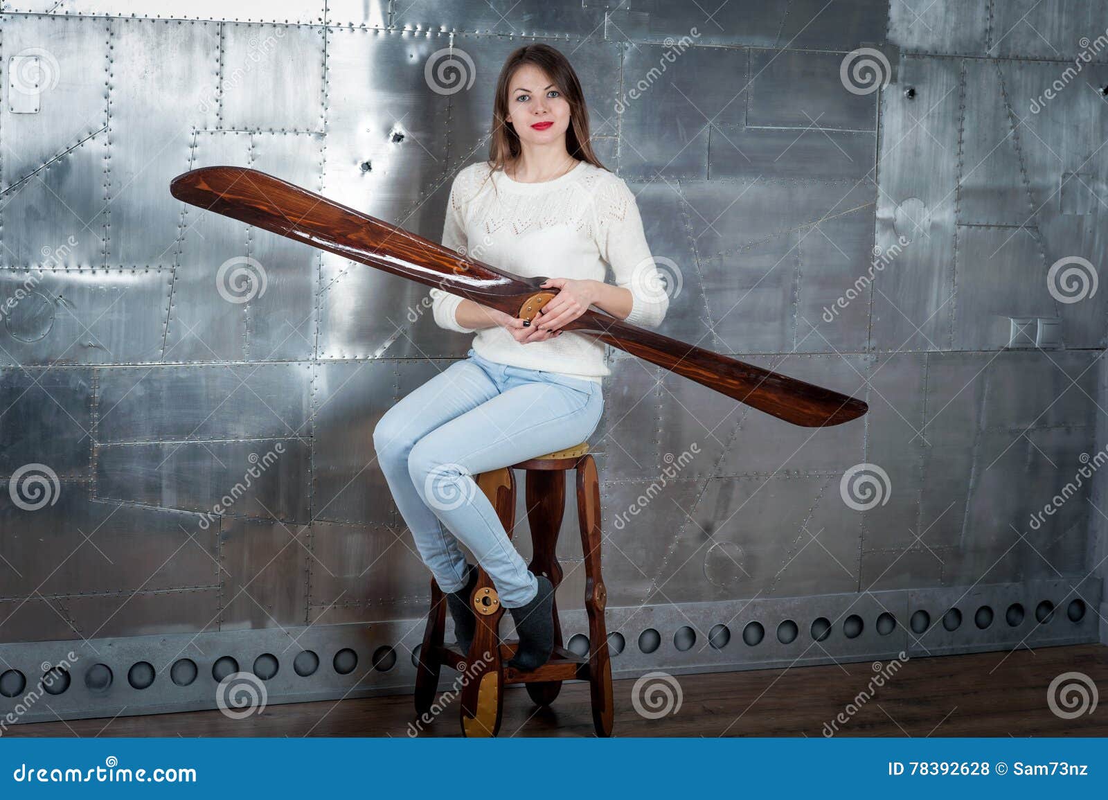 Young woman with propeller stock photo. Image of imagination 78392628