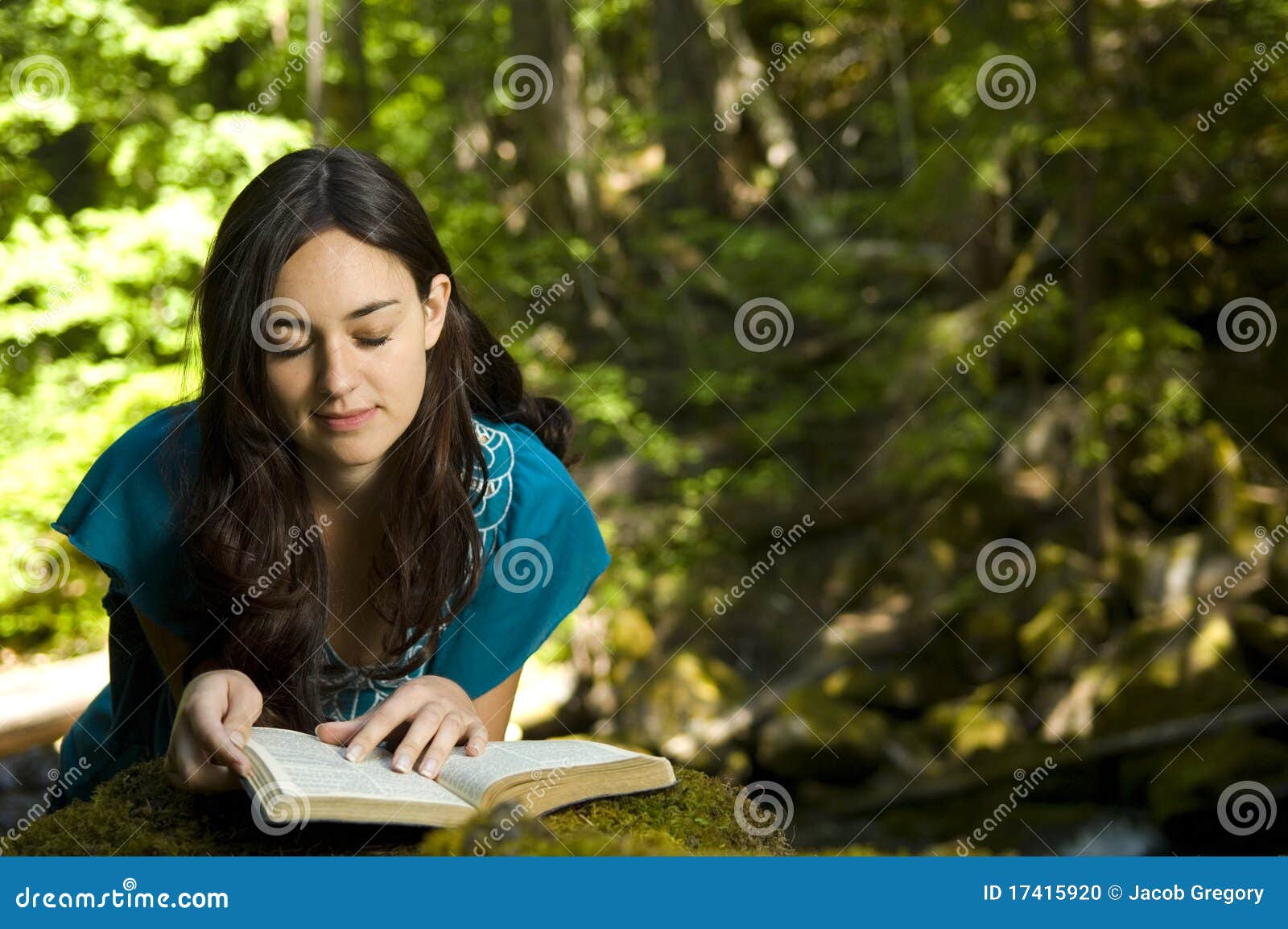 young woman reading bible