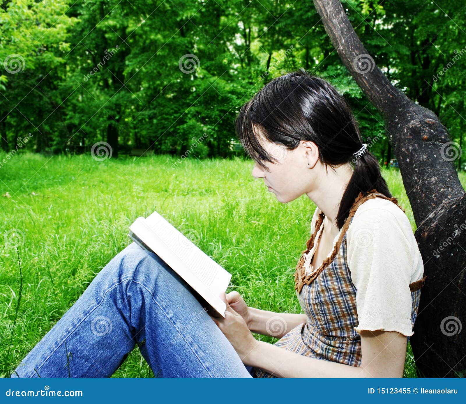 young woman reading a novel