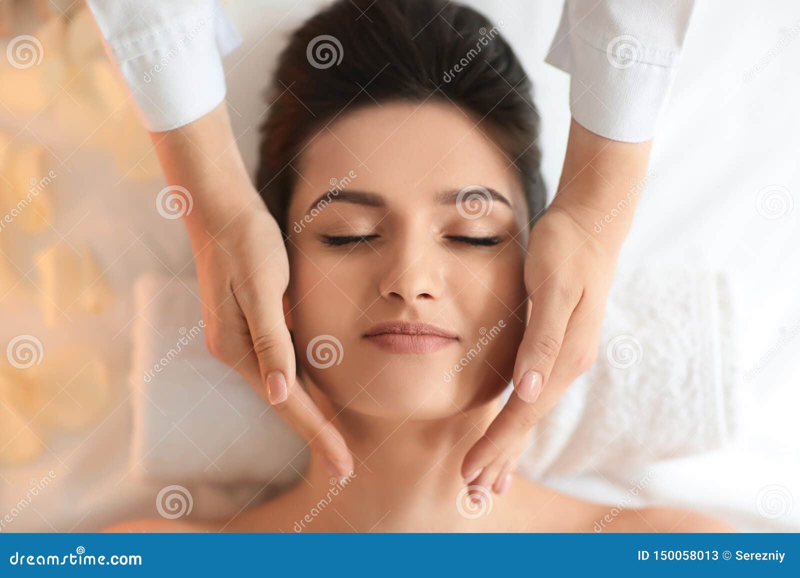 Young Woman Receiving Face Massage In Spa Salon Top View Stock Image Image Of Lifestyle