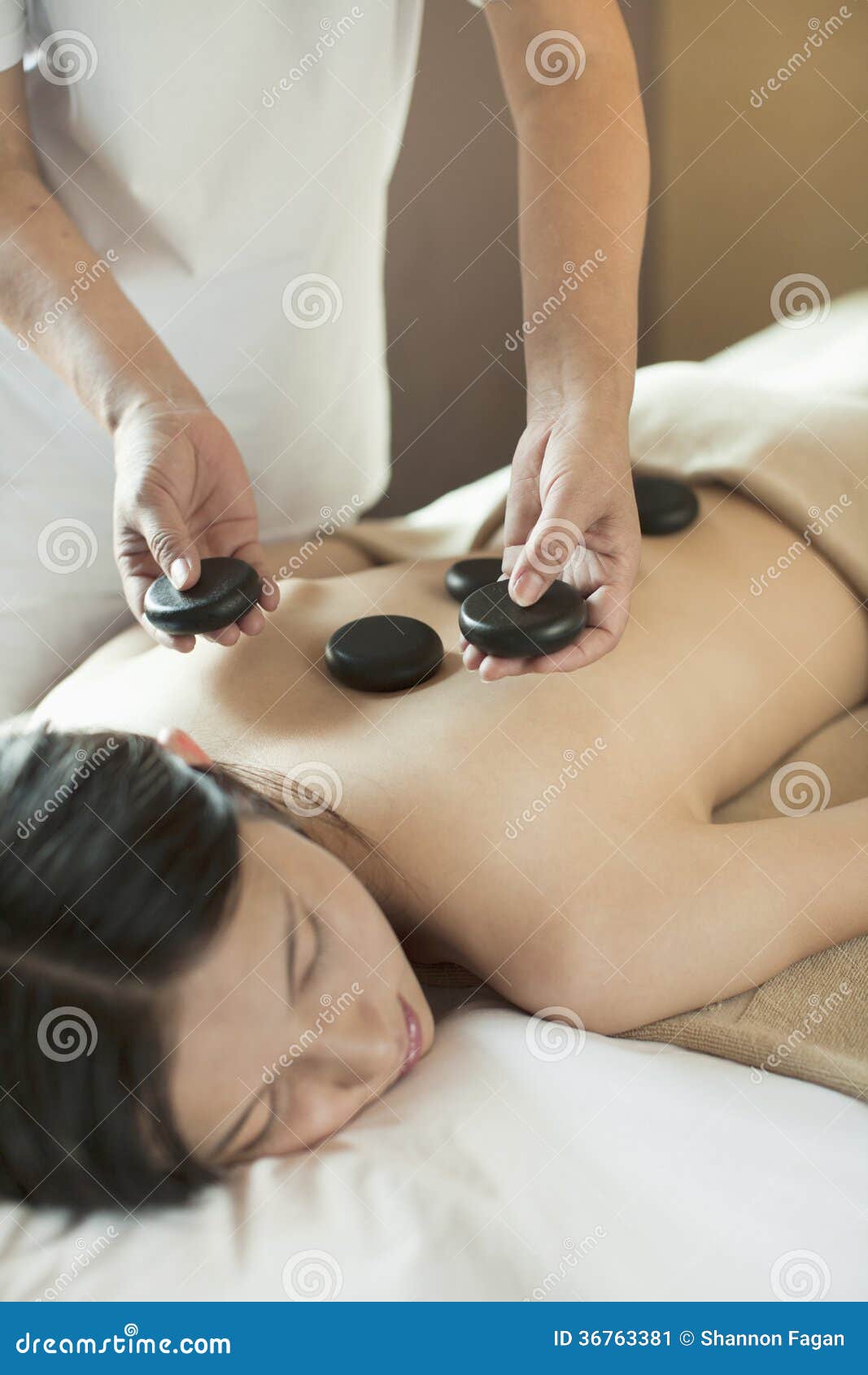 Young Woman Receiving Hot Stone Massage Stock Image Image Of Body