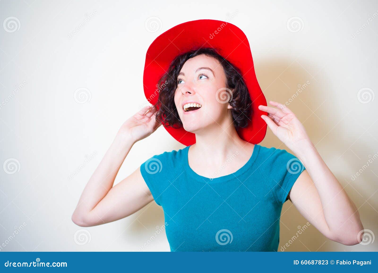 Young Woman with Red Hat and Blue Dress Posing Stock Image - Image of ...