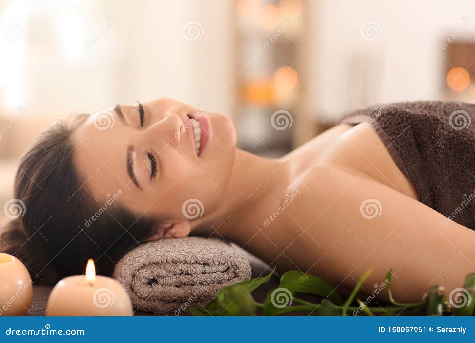 Young Woman Relaxing On Massage Table At Spa Salon Stock Image Image