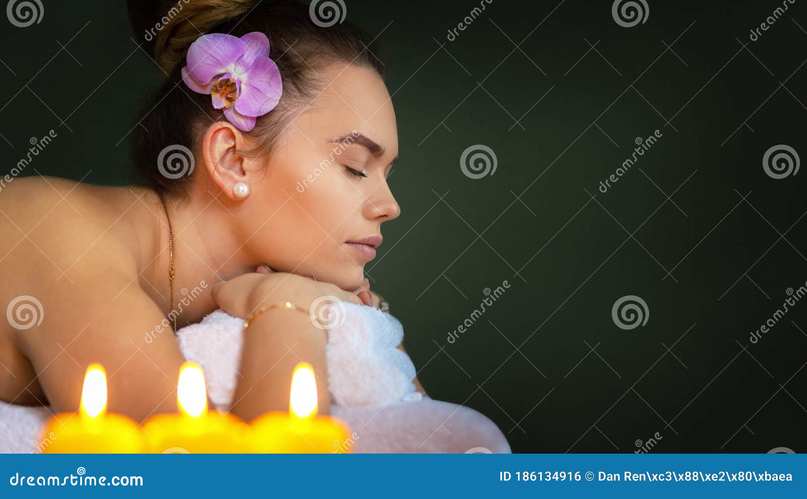 Young Woman Relaxing During Massage Therapy At Luxury Beauty Spa Stock