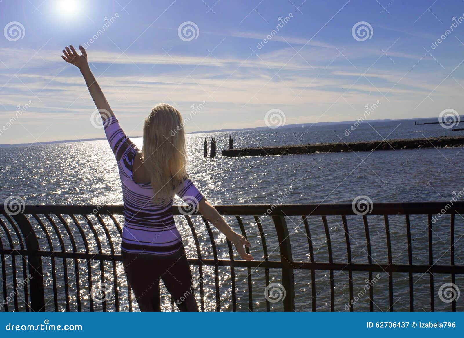 young woman relaxing at the ocean.