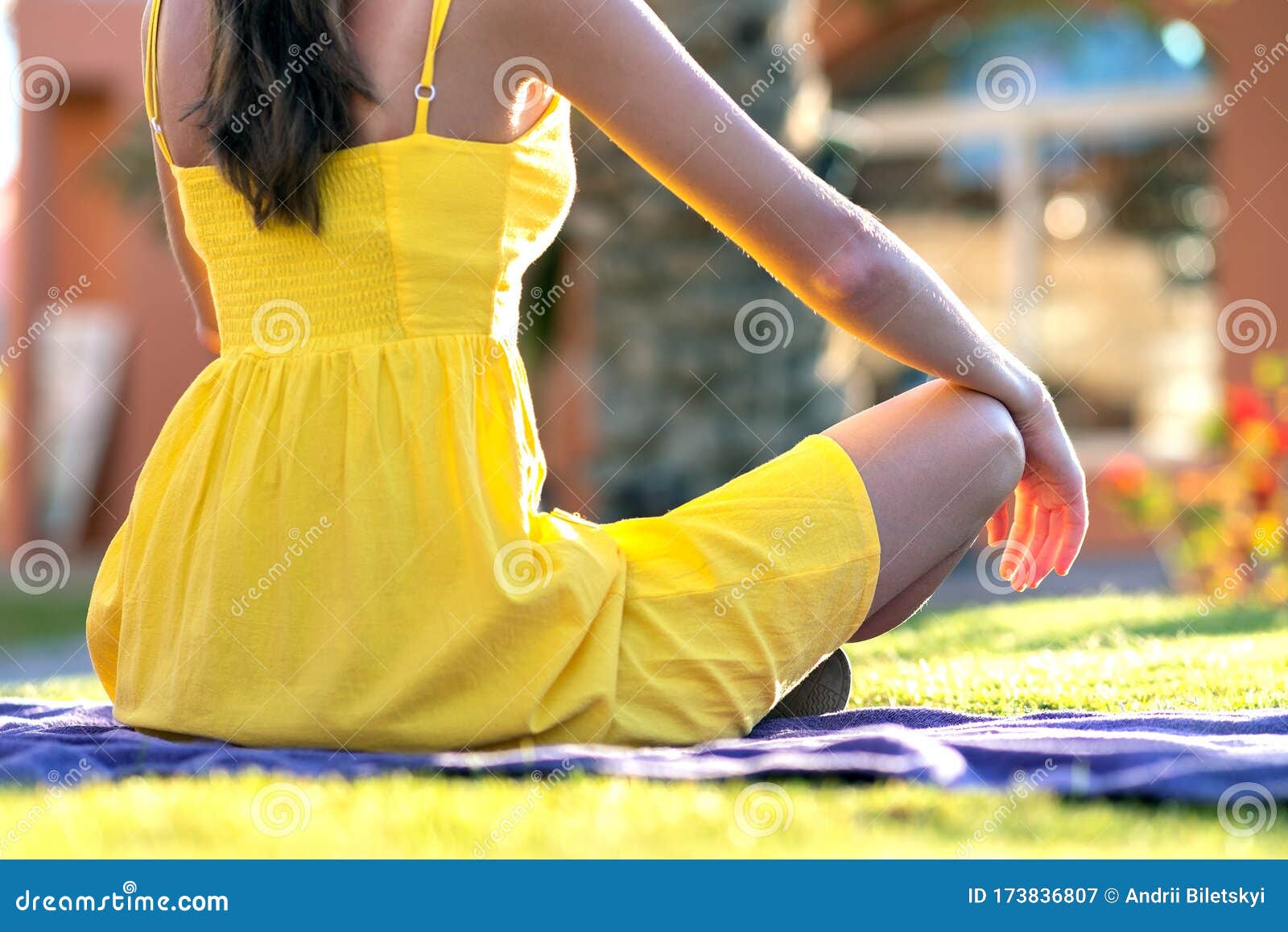 Young Woman Relaxing Outdoors On Sunny Summer Day. Happy Lady Sitting On Green Grass Lawn ...